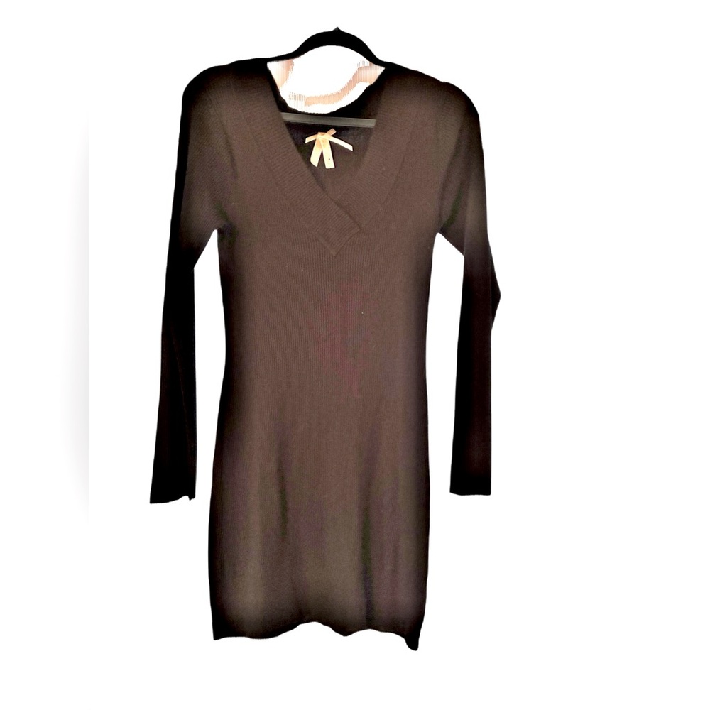 Black sweater dress. Not too short.